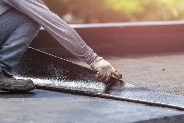 Professional Basement Waterproofing technician working in Riegelsville, PA